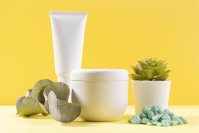 potted plant with cosmetic containers scaled
